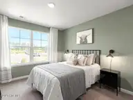 4262 Allsbrook Lane Unit 1015, Leland, NC 28451 — 3-bedroom townhome in Indigo Preserve, Leland, NC, photo 22 of 42: 2nd Bedroom
