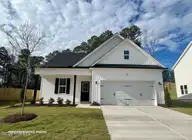 686 Springtooth Drive, Zebulon, NC 27597 — 3-bedroom home in Harvest Meadows, Zebulon, NC, photo 1 of 8: Representative Photo