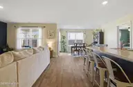 8162 Finchley Street NE, Leland, NC 28451 — 3-bedroom home in SeaBrooke, Leland, NC, photo 18 of 48: 24_living room kitchen