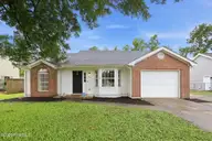 205 Mahogany Drive, Jacksonville, NC 28540 — 3-bedroom home in Tanglewoods, Jacksonville, NC, photo 1 of 60