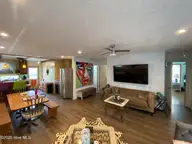 3518 E Beach Drive, Oak Island, NC 28465 — 3-bedroom waterfront home in E. Long Beach, Oak Island, NC, photo 9 of 39: IMG_4303
