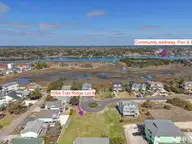 1064 8 Tide Ridge Drive, Holden Beach, NC 28462 — waterfront lot in Pointe West, Holden Beach, NC, photo 13 of 42: 1064TideRidgeLot8 - 13