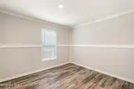 6745 Lewis Drive SE, Winnabow, NC 28479 — 3-bedroom manufactured home in Lewis Acres, Winnabow, NC, photo 24 of 28: guest bedroom