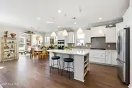 707 Broomsedge Terrace, Wilmington, NC 28412 — 2-bedroom home in Riverlights - Del Webb, Wilmington, NC, photo 3 of 31: Kitchen, dining room