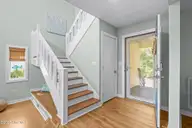 300 Mcginnis Drive, Pine Knoll Shores, NC 28512 — 3-bedroom waterfront condo in Mcginnis Point, Pine Knoll Shores, NC, photo 6 of 57: Entrance