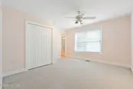 86 Plantation Passage Drive SE, Bolivia, NC 28422 — 4-bedroom waterfront home in Winding River Plantation, Bolivia, NC, photo 24 of 77: Bedroom 2