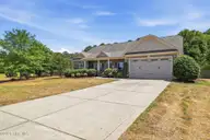 207 Brightleaf Drive, Whispering Pines, NC 28327 — 5-bedroom home in Summerfield at Arrowstone, Whispering Pines, NC, photo 3 of 51: Front