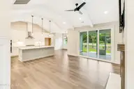 394 Sea Trail Drive W, Sunset Beach, NC 28468 — 4-bedroom home in Sea Trail Plantation, Sunset Beach, NC, photo 7 of 76: Great Room- Kitchen