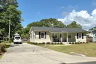 2000 Harbor Drive SW, Ocean Isle Beach, NC 28469 — 3-bedroom waterfront home in Marlee Acres, Ocean Isle Beach, NC, photo 3 of 27: Plenty of parking in the driveway