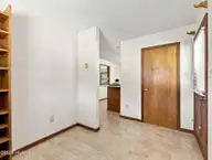 519 Edwards Road, Jacksonville, NC 28540 — 2-bedroom home, Jacksonville, NC, photo 24 of 58: Multi-purpose Room to Carport Door
