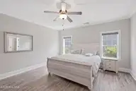 5732 Brown Pelican Lane, Wilmington, NC 28409 — 4-bedroom home in Kaylies Cove, Wilmington, NC, photo 21 of 38: 19_primary bedroom