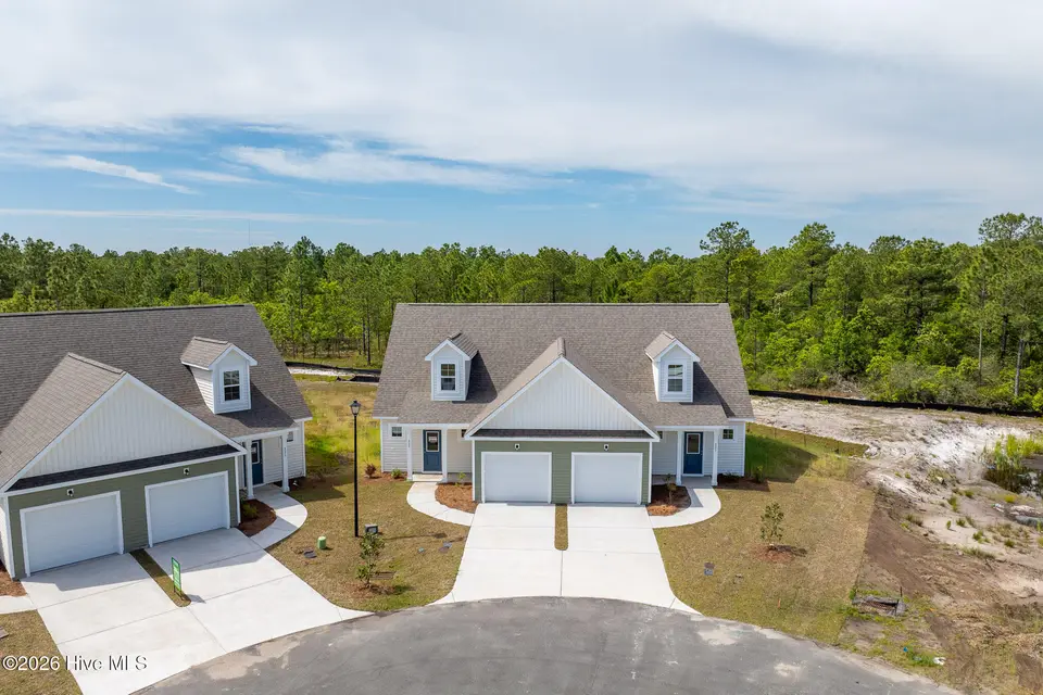 225 Sandpiper Place, Holly Ridge, NC 28445 — 3-bedroom townhome in Coastal Village, Holly Ridge, NC, photo 1 of 30: Sandpiper Place - Exterior_Aerial - MLS_