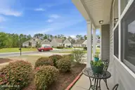 3095 Crescent Lake Drive, Calabash, NC 28467 — 3-bedroom home in Calabash Lakes, Calabash, NC, photo 15 of 74: Front Porch