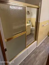 1701 S Nc 41 And 111 Highway, Beulaville, NC 28518 — 4-bedroom home, Beulaville, NC, photo 16 of 27: hallway bathroom shower