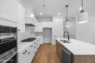 1213 Rockhill Road, Castle Hayne, NC 28429 — 4-bedroom waterfront home in Sunset Reach, Castle Hayne, NC, photo 20 of 63: 19_kitchen