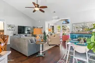 7568 Dunbar Drive SW, Sunset Beach, NC 28468 — 3-bedroom waterfront home in Sandpiper Bay, Sunset Beach, NC, photo 13 of 51: Open concept, Vaulted ceilings