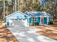 570 Captains Court SE, Bolivia, NC 28422 — 3-bedroom waterfront home in River Run Plantation, Bolivia, NC, photo 2 of 55: 002_570_captains_court_se-02_861