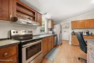 122 Lejeune Road, Cape Carteret, NC 28584 — 3-bedroom home in Bayshore Park, Cape Carteret, NC, photo 21 of 43: Kitchen