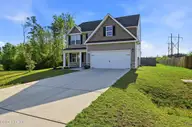697 Poppleton Drive, Hampstead, NC 28443 — 4-bedroom home in Harrison Cove, Hampstead, NC, photo 4 of 46: 3_697_poppleton_dr_003