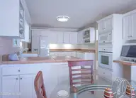 12 Whithorn Court, Pinehurst, NC 28374 — 3-bedroom home in Pinewild CC, Pinehurst, NC, photo 15 of 33: Kitchen4