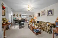1601 River Bluff Road, Morehead City, NC 28557 — 3-bedroom waterfront home in South Shores, Morehead City, NC, photo 6 of 32: Formal living room