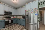 273 Inverness Drive, Hubert, NC 28539 — 3-bedroom home in Highlands at Queens Creek, Hubert, NC, photo 18 of 41: 20KITCHEN