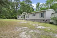 552 Colonial Landing Road SE, Bolivia, NC 28422 — 2-bedroom waterfront manufactured home in Vineyard Landing, Bolivia, NC, photo 6 of 52: 6-web-or-mls-Front ext angle