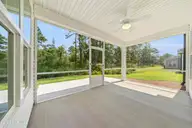 459 Galloping Foal Way SE, Bolivia, NC 28422 — 4-bedroom home in River Tide Farms, Bolivia, NC, photo 22 of 35: Back Porch