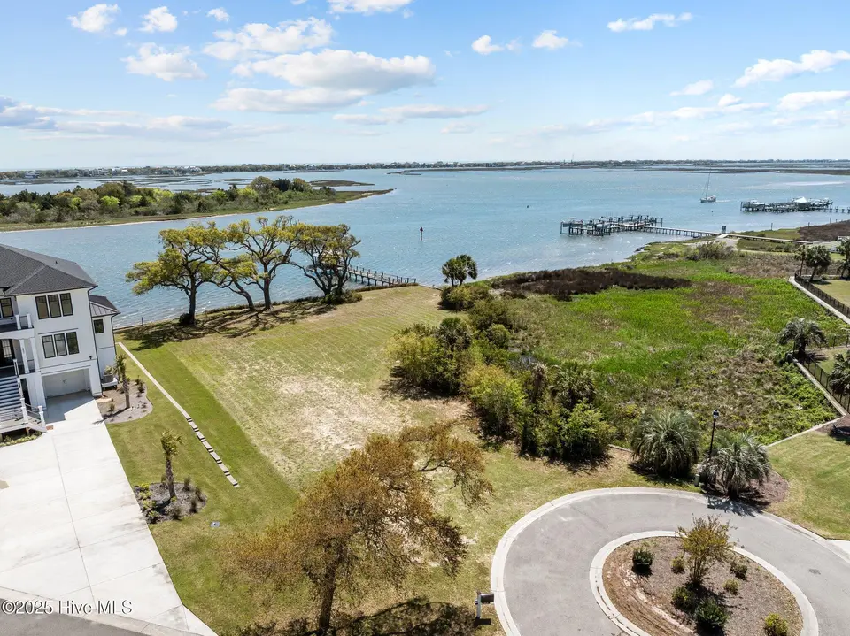 Lot 21r Shipyard Lane, Hampstead, NC 28443 — waterfront lot in Sloop Point Plantation, Hampstead, NC, photo 1 of 36: 10-web-or-mls-DJI_20250409111752_0108_D