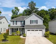 9289 Cassadine Court, Leland, NC 28451 — 4-bedroom home in Windermere Estates, Leland, NC, photo 1 of 48: 1-web-or-mls-DJI_20260417154904_0986_D