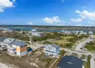 6901 W Beach Drive, Oak Island, NC 28465 — 4-bedroom waterfront home in Kings Lynn, Oak Island, NC, photo 10 of 71: 6901 W Beach Rev MLS-8