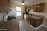 302 Paddock Place, Jacksonville, NC 28546 — 3-bedroom home in Horse Creek Farms, Jacksonville, NC, photo 13 of 16: kitchen