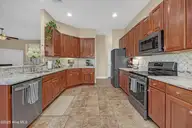 1226 Atrium Way, Leland, NC 28451 — 3-bedroom waterfront home in Waterford of the Carolinas, Leland, NC, photo 12 of 61: Kitchen