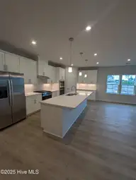 1276 Piper Glen Drive, Sunset Beach, NC 28468 — 3-bedroom home in Sea Trail Plantation, Sunset Beach, NC, photo 2 of 17: Kitchen