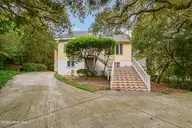 579 Coral Ridge Road, Pine Knoll Shores, NC 28512 — 4-bedroom waterfront home in Beacon's Reach, Pine Knoll Shores, NC, photo 1 of 62: Front Exterior