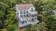 8722 Emerald Plantation Road, Emerald Isle, NC 28594 — 4-bedroom waterfront home in Emerald Plantation, Emerald Isle, NC, photo 14 of 63: 61-web-or-mls-DJI_20250821135000_0192_D