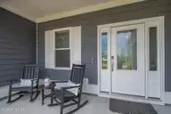 421 Taylorwood Drive, Beaufort, NC 28516 — 4-bedroom home in Beaufort Club, Beaufort, NC, photo 3 of 43: Front porch