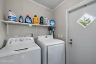 1109 Nautical Lane SW, Calabash, NC 28467 — 4-bedroom manufactured home in Village At Calabash, Calabash, NC, photo 11 of 34: Laundry