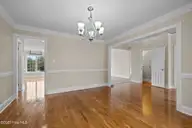 107 Magens Way, Cedar Point, NC 28584 — 3-bedroom waterfront home in Magens Bay, Cedar Point, NC, photo 7 of 58: Dining Room