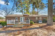 102 Robinson Drive, Goldsboro, NC 27534 — 3-bedroom home in Bellwood, Goldsboro, NC, photo 2 of 22: 1/2+ Acres, Fenced Yard, Large Deck