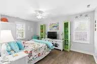 124 NE 15th Street, Oak Island, NC 28465 — 3-bedroom home in Long Beach, Oak Island, NC, photo 23 of 51: thumbnail-0196a7bd-0212-7201-b32e-e2b173