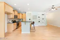 128 Wembley Drive, Clayton, NC 27527 — 3-bedroom townhome in Flowers Plantation, Clayton, NC, photo 6 of 22: kitchen