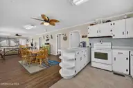 501 W Beach Drive, Oak Island, NC 28465 — 3-bedroom waterfront home in Long Beach, Oak Island, NC, photo 11 of 60