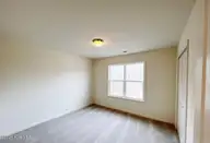 502 Pate Drive, Midway Park, NC 28544 — 2-bedroom townhome in Boyington Place, Midway Park, NC, photo 13 of 19: back bedroom
