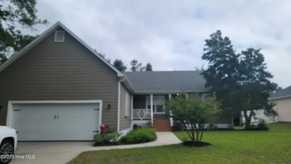 5875 Lycia Lane SW, Ocean Isle Beach, NC 28469 — 3-bedroom home in Crownstream, Ocean Isle Beach, NC, photo 1 of 25