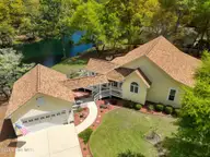 3089 Channel Drive SE, Bolivia, NC 28422 — 3-bedroom home in River Run Plantation, Bolivia, NC, photo 2 of 71: 3089ChannelDriveAerials-513
