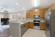 2808 Bloomfield Lane Unit 305, Wilmington, NC 28412 — 2-bedroom condo in Bellingham Park Condo, Wilmington, NC, photo 9 of 37: Bloomfield2808-305-5kitShaneL33A6781-CR2