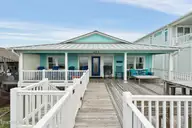 491 Ocean Boulevard W, Holden Beach, NC 28462 — 4-bedroom waterfront home in Holden Beach, Holden Beach, NC, photo 2 of 47: 491 Ocean Blvd W