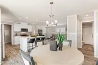 6745 Lewis Drive SE, Winnabow, NC 28479 — 3-bedroom manufactured home in Lewis Acres, Winnabow, NC, photo 14 of 28: Dining area