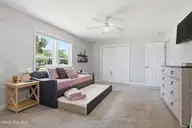 201 Mansfield Parkway, Morehead City, NC 28557 — 4-bedroom waterfront home in Morehead Bluffs, Morehead City, NC, photo 16 of 50: Downstairs Bedroom 1